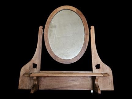 Miroir pivotant sur une structure d'applique en bo