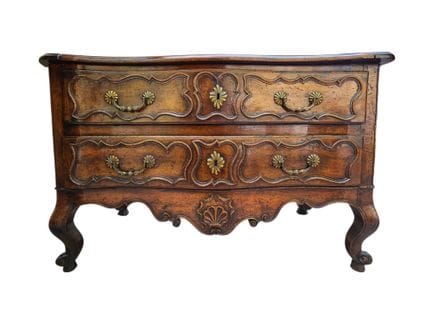 A Nîmes-style chest of drawers made of carved, mol