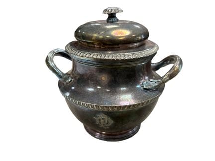 A silver plated metal set consisting of a milk jug