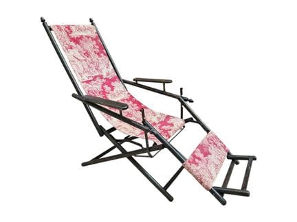 Recliner with a carved and stained wooden mechanis