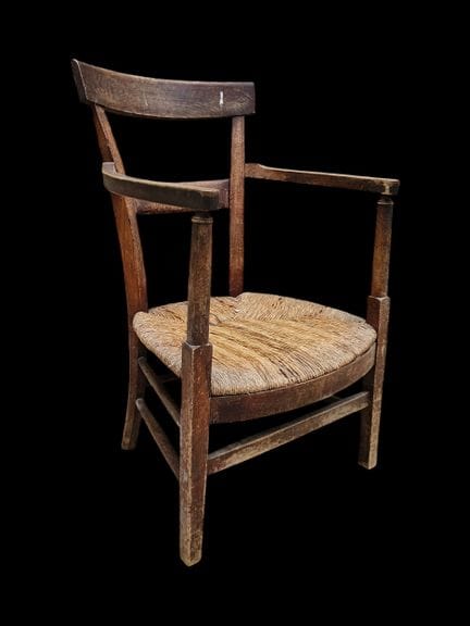 Carved wooden armchair with a straw seat
H: 88 cm
