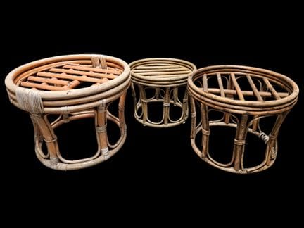 Set of three mismatched curved rattan ottomans
(sc