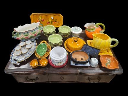 A set of polychrome glazed ceramic pieces, includi