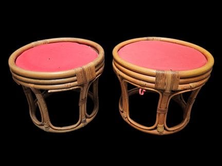Pair of bent and stained rattan ottomans with a si