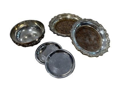 A silver plated metal set consisting of two bottle
