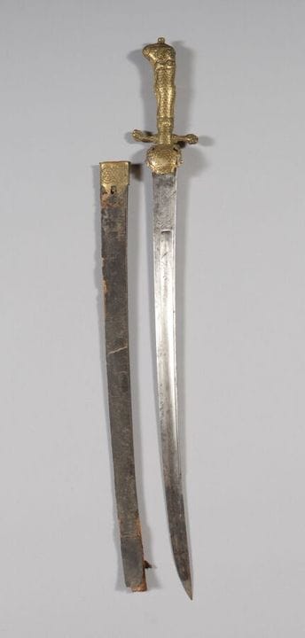Hunting knife with a gilded brass mount finely cha