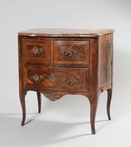 Small, curved chest of drawers made of violet wood