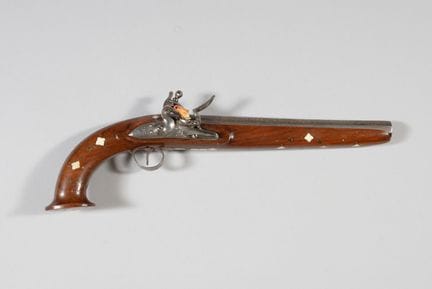 A flintlock pistol for the Orient with a walnut st