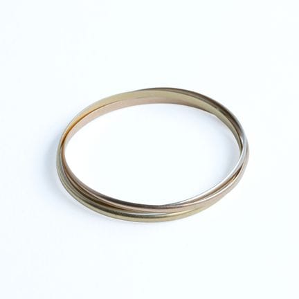 CARTIER. 
"Trinity" bracelet in three 18k golds (7