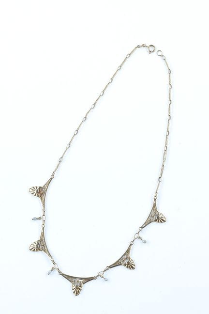 An 18k yellow gold (750) draped necklace with open