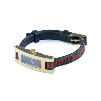 GUCCI. 
Rectangular women's wristwatch in gold-ton