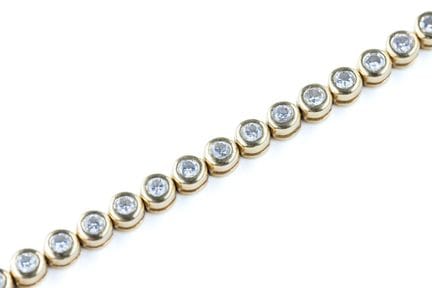 An 18k yellow gold (750) river or tennis bracelet 