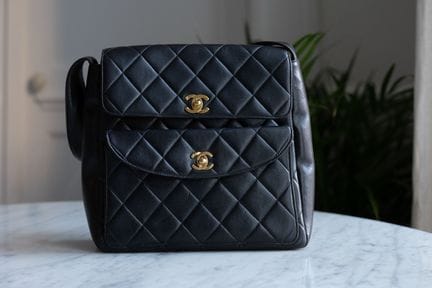 CHANEL. 
Dark brown quilted lambskin double-flap b