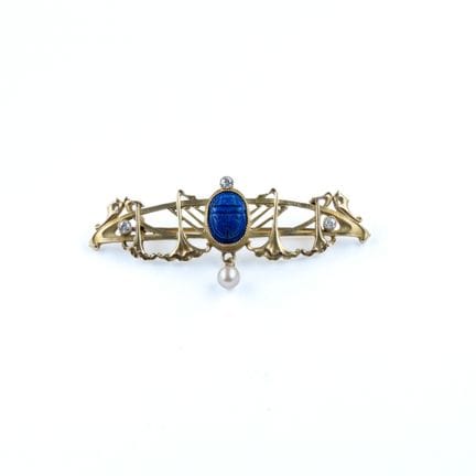 An 18k yellow gold (750) brooch with openwork desi