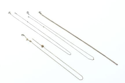 Set of three 18k yellow gold (750) forçat-link nec