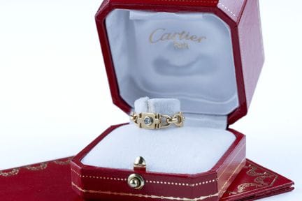 CARTIER. 
"Etrier" ring in 18k yellow and white go