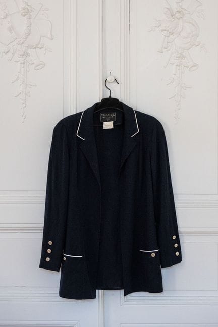 CHANEL. 
Navy blue wool jacket with white trim, la