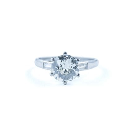 An 850-th platinum solitaire set with a round old-