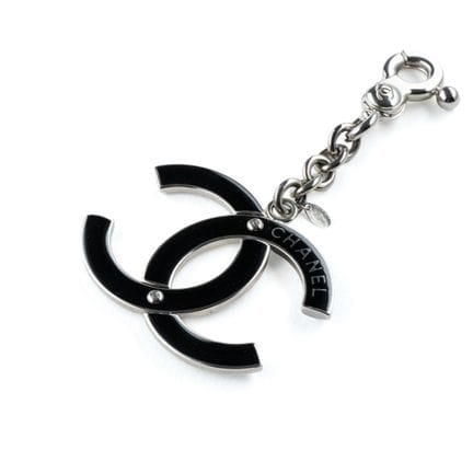 CHANEL. 
Key chain or handbag charm in silver plat