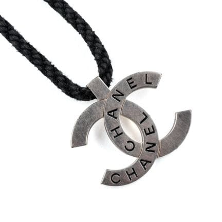 CHANEL. 
Double C pendant in silver plated metal w