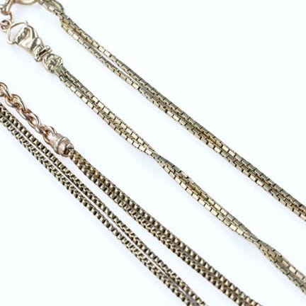 Conjunto de dos cadenas tipo chaleco de oro amaril