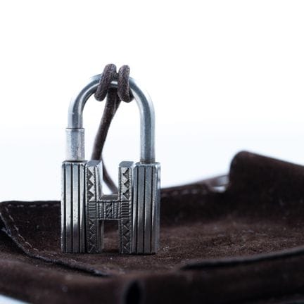 HERMES. 
925 sterling silver "H" padlock, "Touareg