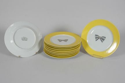 Christian Dior 10 plates with bow design, yellow r