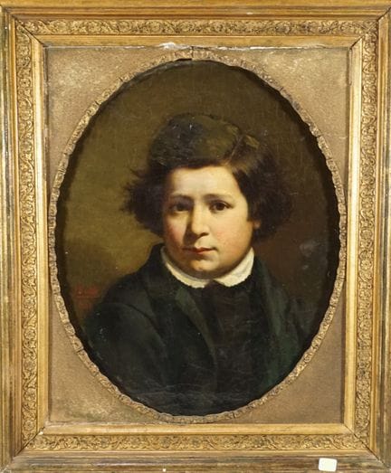 19世纪画派。小男孩肖像。布面油画。46 x 37 厘米。椭圆形镀金木框，表面有瑕疵（经修复）