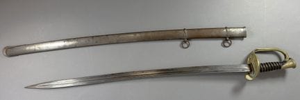 Officer's saber with a metal scabbard. Included is