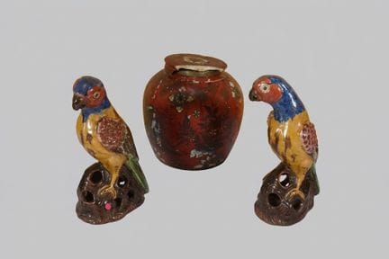 Pair of parakeets made of polychrome glazed cerami