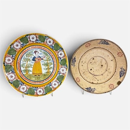 TWO PLATES—one made of ceramic and the other of ea
