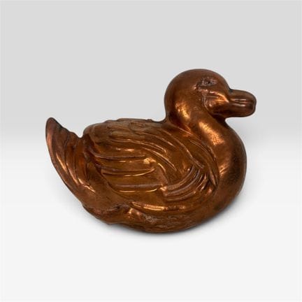 "DUCK" SHAPE made of copper-plated metal. Shows si