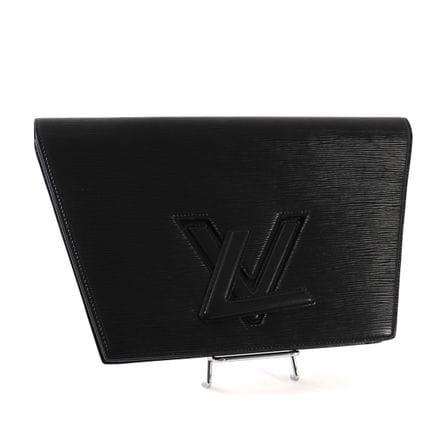 POCHETTE LOUIS VUITTON MODÈLE TRAPÈZE
Pochette en 