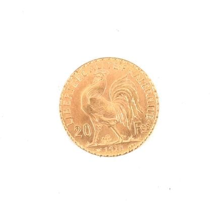 20-FRANC GOLD COIN WITH ROOSTER, 1910
Obverse: Rig
