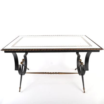 一款精美的茶几，采用吉尔伯特·普瓦耶拉（Gilbert POILLERAT，1902-1988）风格