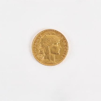 20-FRANC GOLD COIN WITH ROOSTER, 1904
Obverse: Rig