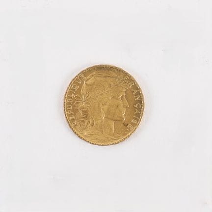 20-FRANC GOLD COIN WITH ROOSTER, 1907
Obverse: Rig