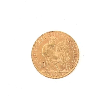 20-FRANC GOLD COIN WITH ROOSTER, 1904
Obverse: Rig