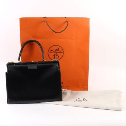 SAC HERMES MODÈLE 404 
Sac à main en cuir box noir