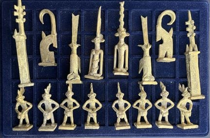 CENTRAL AFRICA
Bronze chess pieces with a medal-li