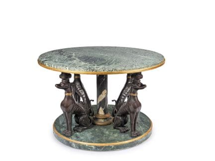 Raro tavolino rotondo in bronzo e legno modanato, 