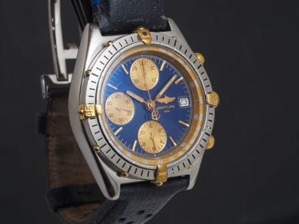 百年灵Chronomat 型号 B13048
钢链计时码表。圆形表壳，配有刻度可旋转外圈及黄金四分之