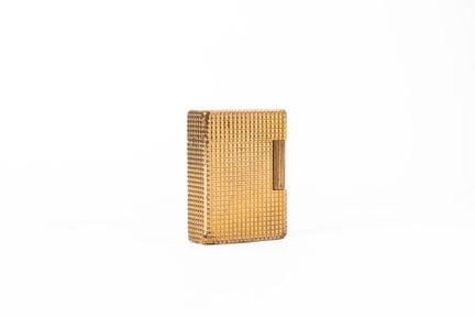 S.T. DUPONT
Gold-plated metal gas lighter.
Clou de
