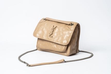 SAINT LAURENT
Borsa Niki in pelle invecchiata di c