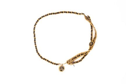 CHANEL
Belt with a gold-tone metal buckle and blac