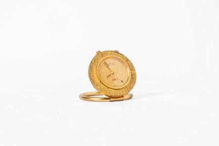 LANCEL
Orologio da viaggio placcato in oro. Modulo