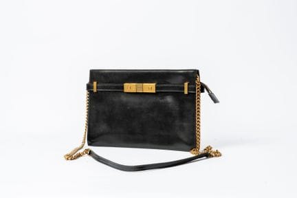 SAINT LAURENT
Borsa a pochette in pelle nera. Fode