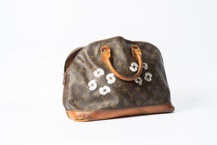 LOUIS VUITTON
Borsa Alma in tela Monogram e pelle 