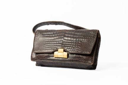 HERMES
Borsa in coccodrillo porosus marrone. Foder