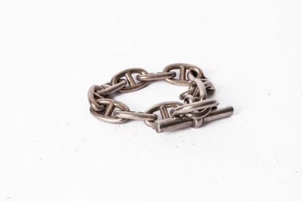 HERMES
Pulsera de cadena con anclas de plata.
Long